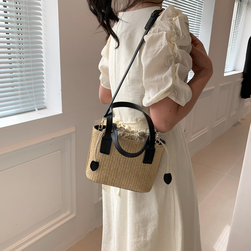 Shes | Marie mini-handtas van stro