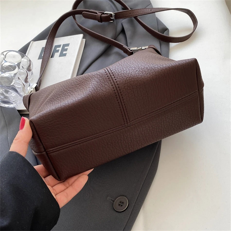 Shes | Roly-schoudertas