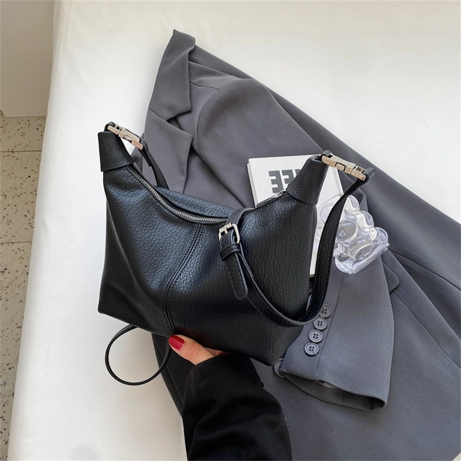 Shes | Roly-schoudertas