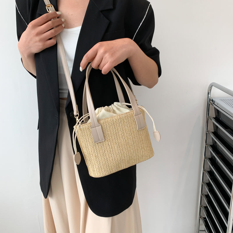 Shes | Marie mini-handtas van stro