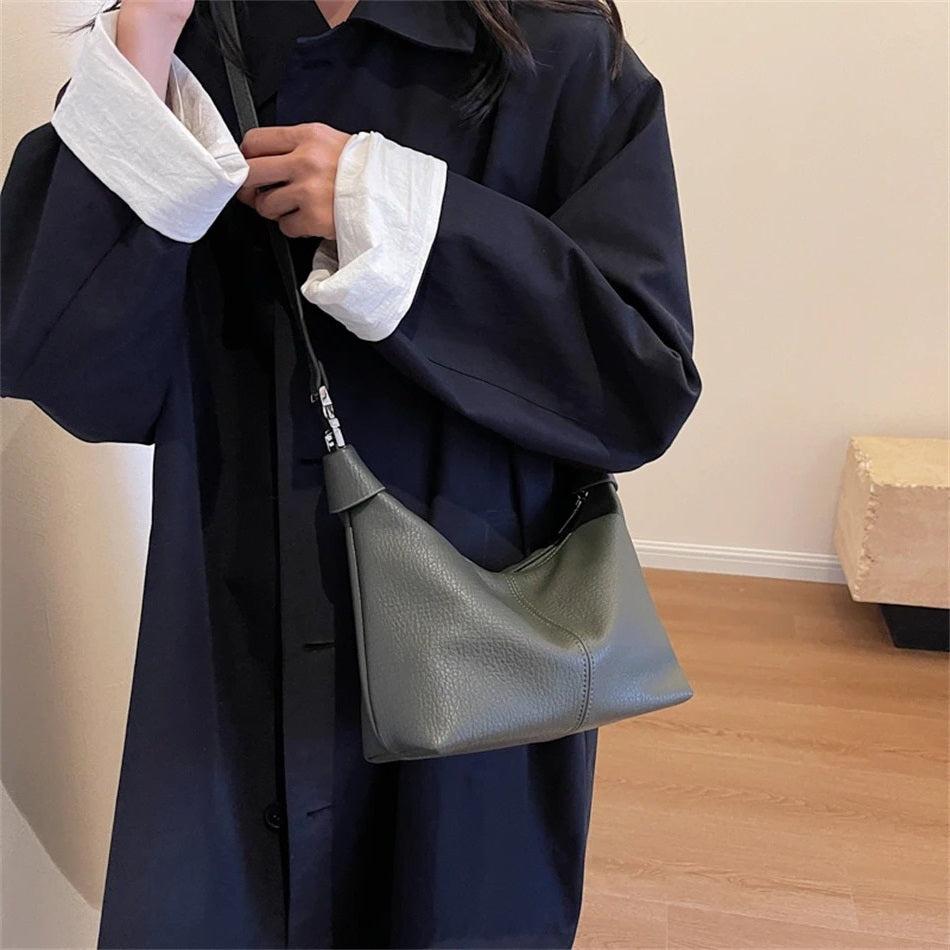 Shes | Roly-schoudertas