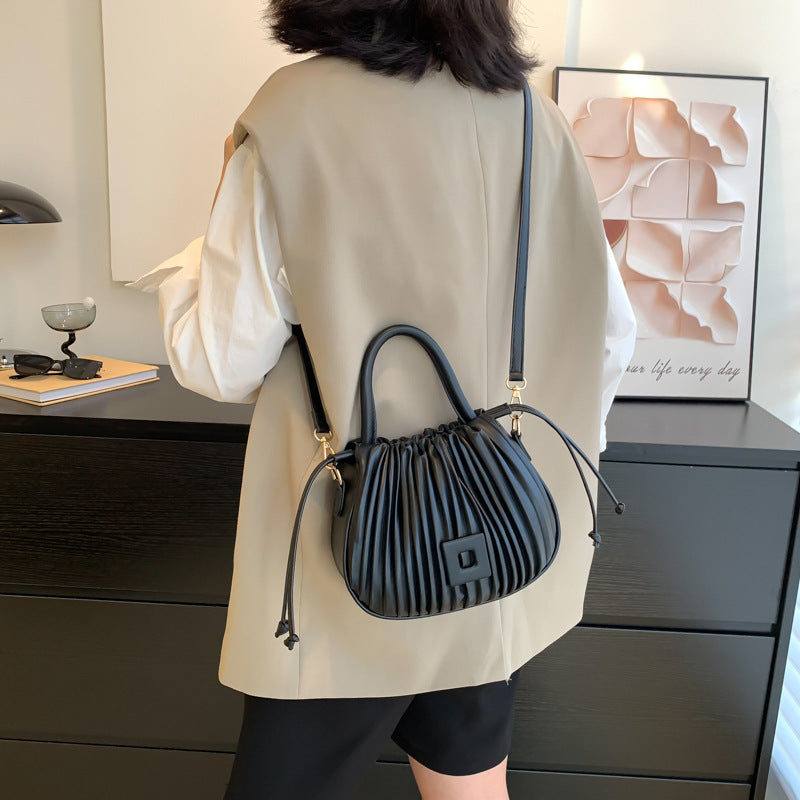 Shes | Orie geplooide handtas