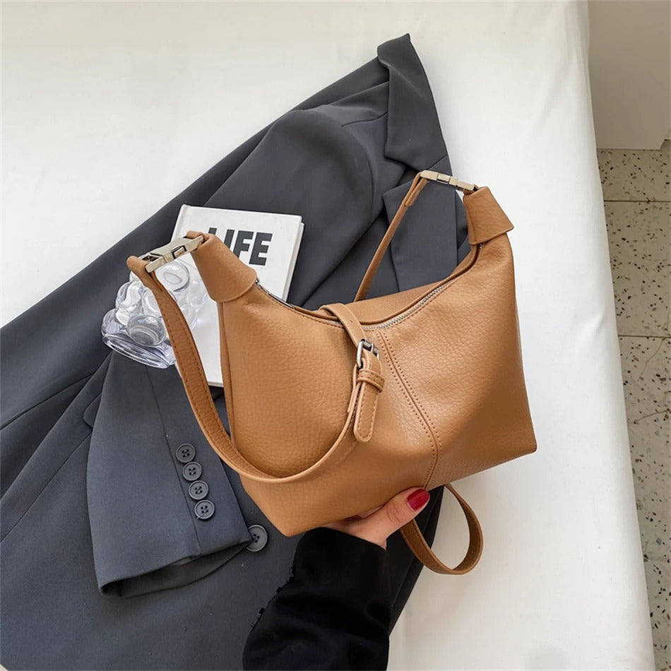 Shes | Roly-schoudertas