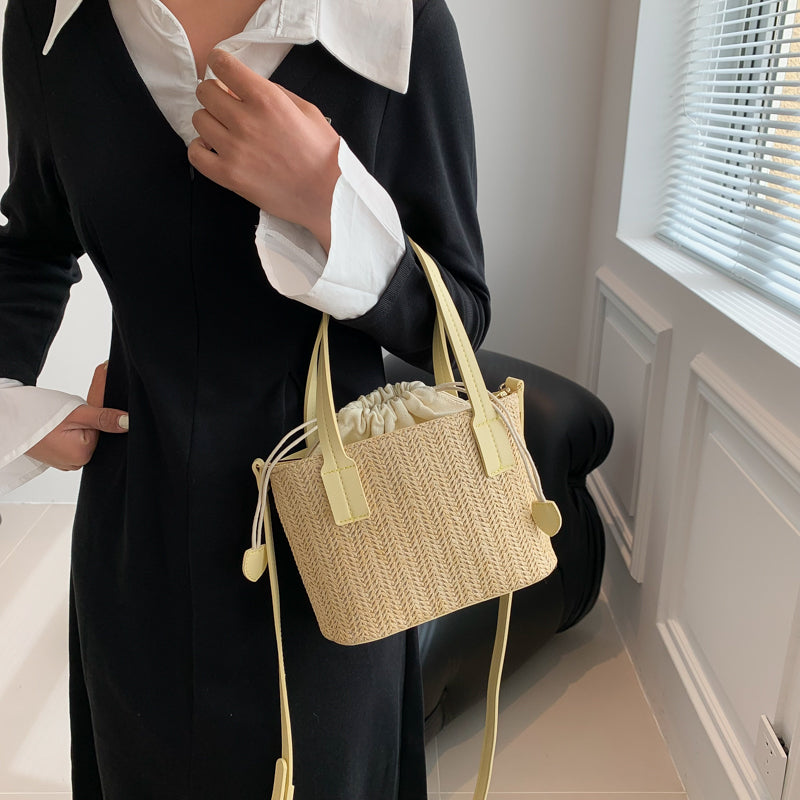 Shes | Marie mini-handtas van stro