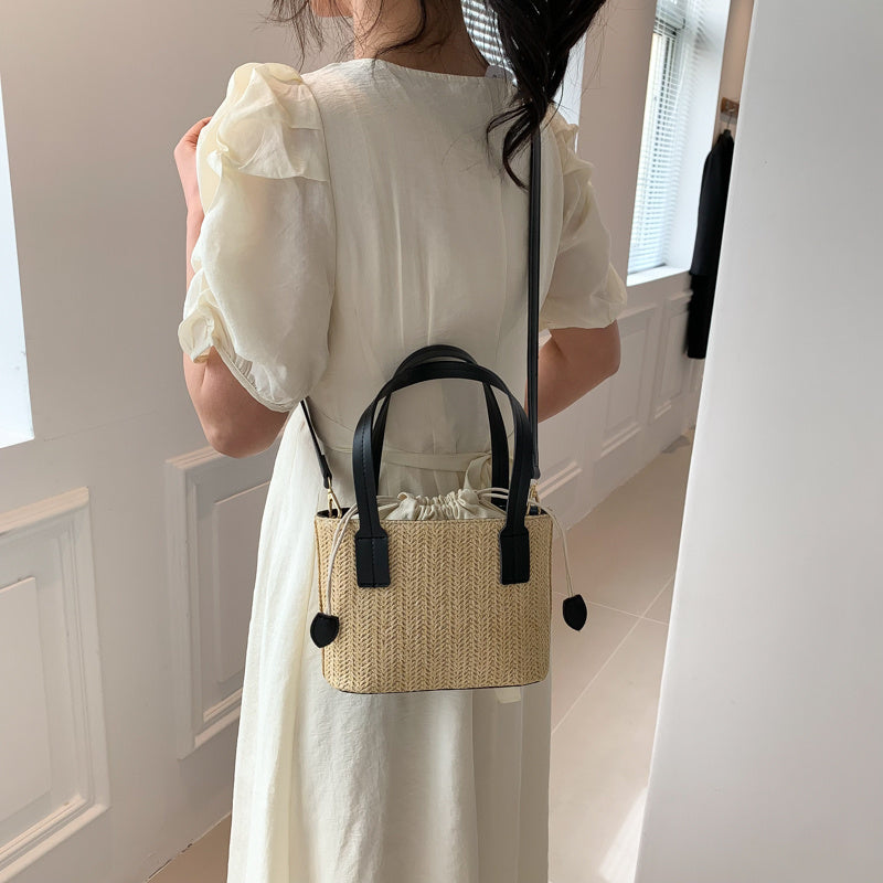 Shes | Marie mini-handtas van stro