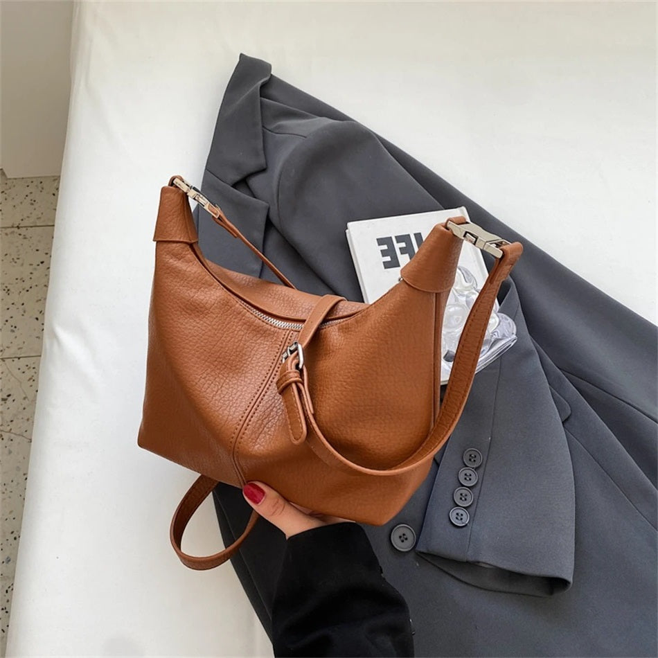 Shes | Roly-schoudertas