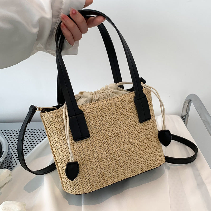 Shes | Marie mini-handtas van stro